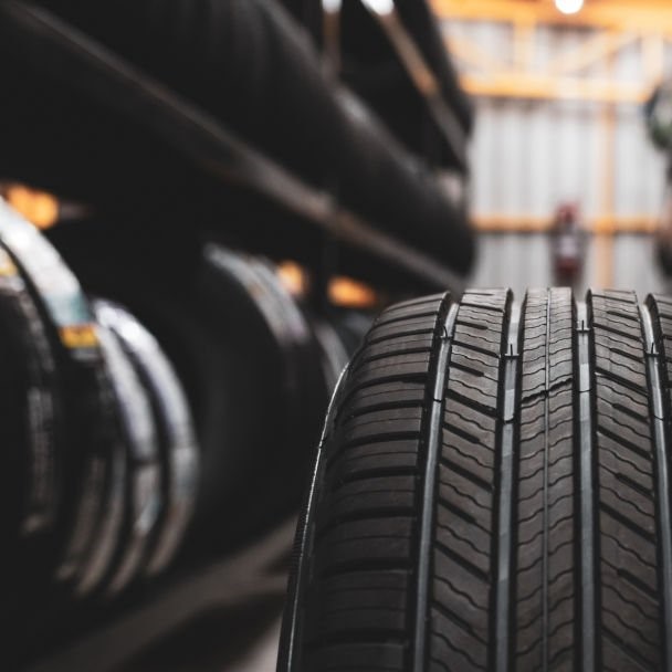 A new tire is placed on the tire storage rack in the car workshop. Be prepared for vehicles that need to change tires.